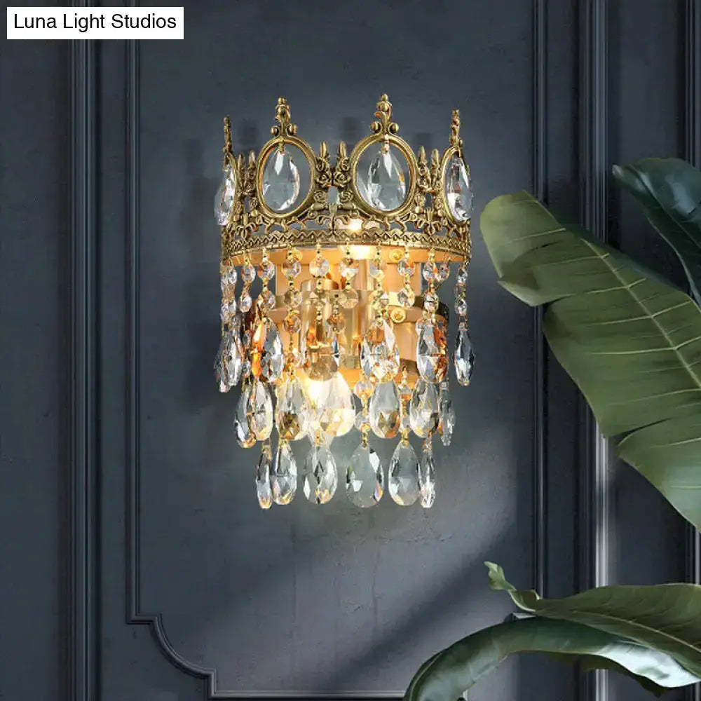 Crown aged brass wall sconce with clear crystal prisms for bedroom lighting Decorbites on Tampa Home & Garden Store