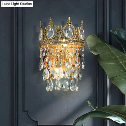Crown aged brass wall sconce with clear crystal prisms for bedroom lighting Decorbites on Tampa Home & Garden Store