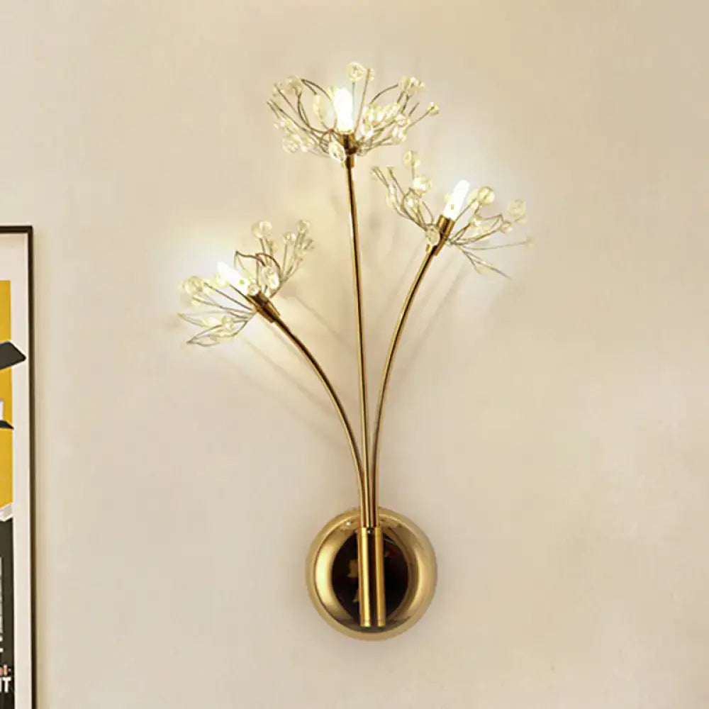 Gold dandelion wall sconce with three LED bulbs in brass finish by Decorbites on Tampa Home & Garden Store