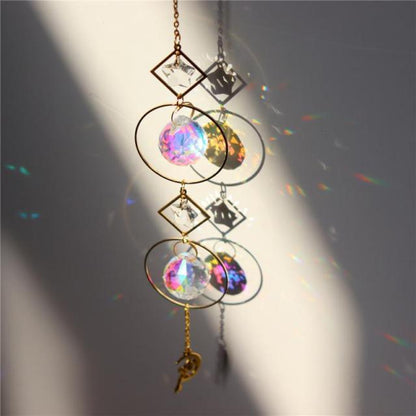 Crystal Dream Wind Chimes with gold-tone hoops and two iridescent crystal spheres, wall hanging decor on Tampa Home & Garden Store