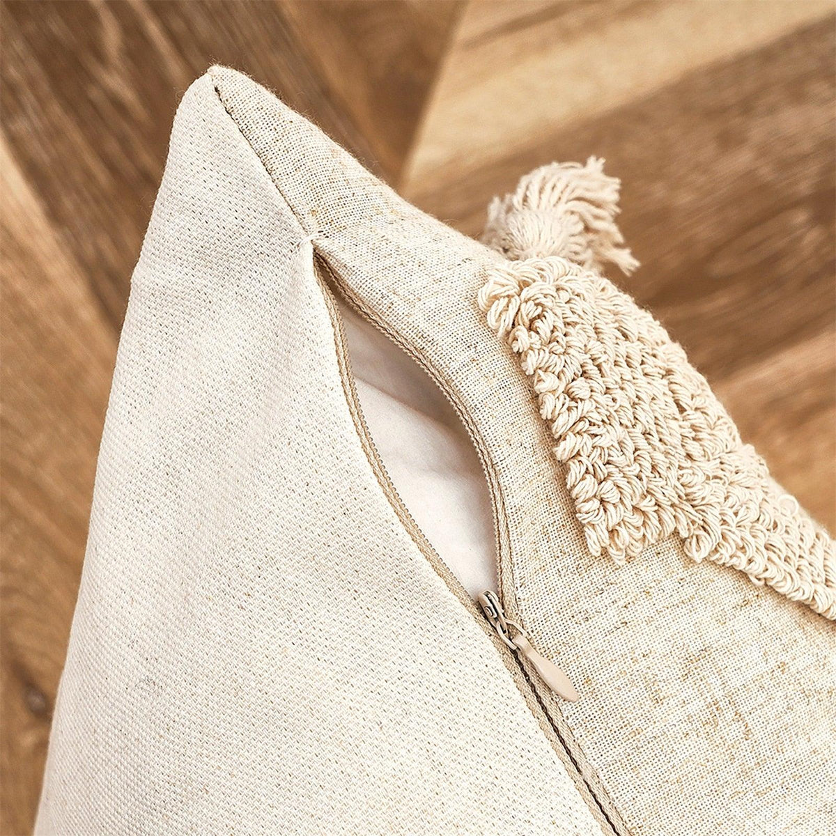 Beige cushion cover with visible zipper and tufted textured edge, cotton-linen hand-woven fabric on Tampa Home & Garden Store