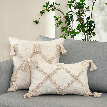 Stevvex cushion covers beige cotton-linen with tufted chevron and tassel fringe on a sofa on Tampa Home & Garden Store