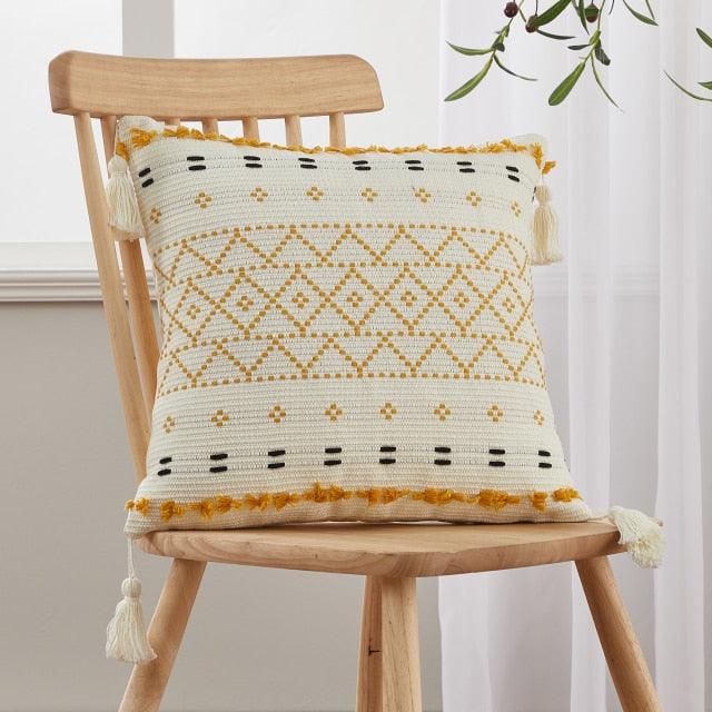 Cushion cover Stevvex cotton linen tufted beige with tassel trim on wooden chair on Tampa Home & Garden Store