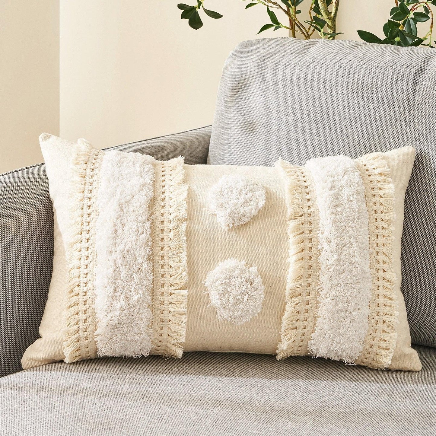 Beige cotton-linen cushion cover with tufted pom-pom details and tassel trim by Stevvex on Tampa Home & Garden Store