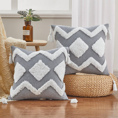 Cushion covers grey cotton-linen blend with white shaggy tufted diamond pattern and tassel trim on Tampa Home & Garden Store