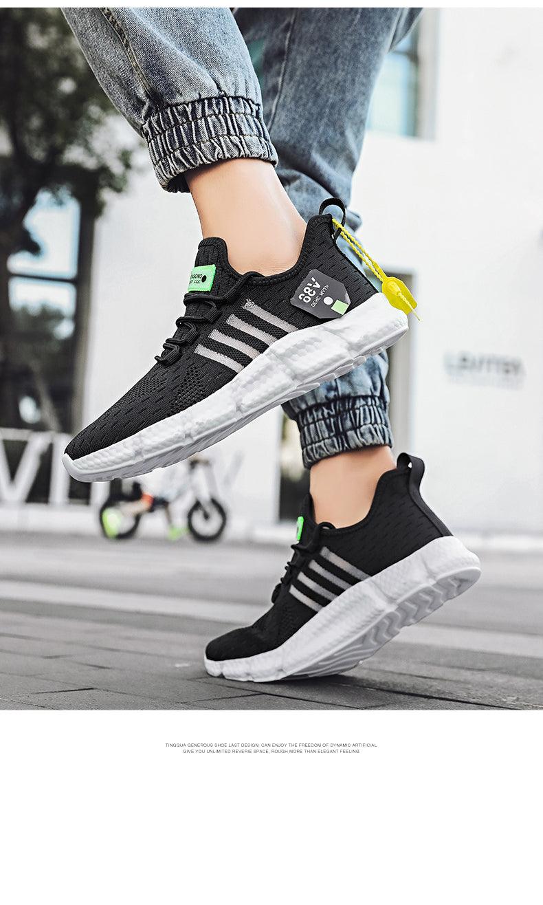 Stevvex men's running sneakers pair in black mesh with white sole and non-slip grip on Tampa Home & Garden Store