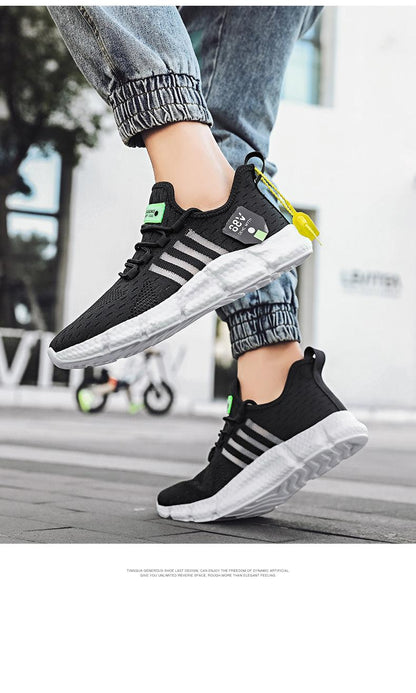 Stevvex men's running sneakers pair in black mesh with white sole and non-slip grip on Tampa Home & Garden Store