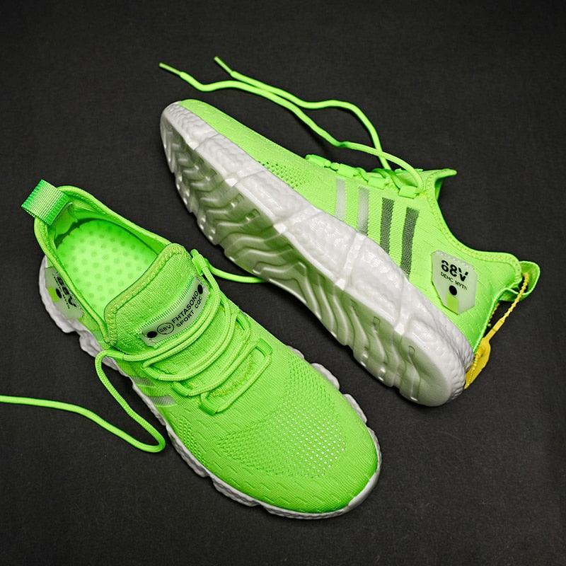 Stevvex men's athletic running shoes neon green breathable mesh pair with non-slip outsole on Tampa Home & Garden Store