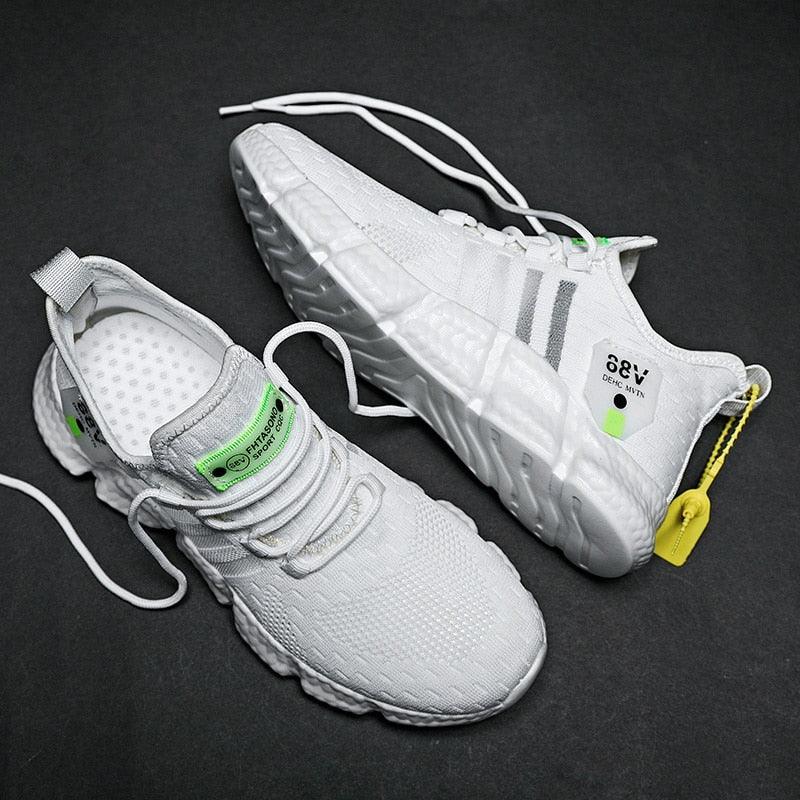 Stevvex white athletic running shoes pair with breathable mesh upper and cushioned non-slip sole on Tampa Home & Garden Store