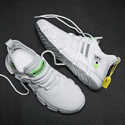 Stevvex white athletic running shoes pair with breathable mesh upper and cushioned non-slip sole on Tampa Home & Garden Store