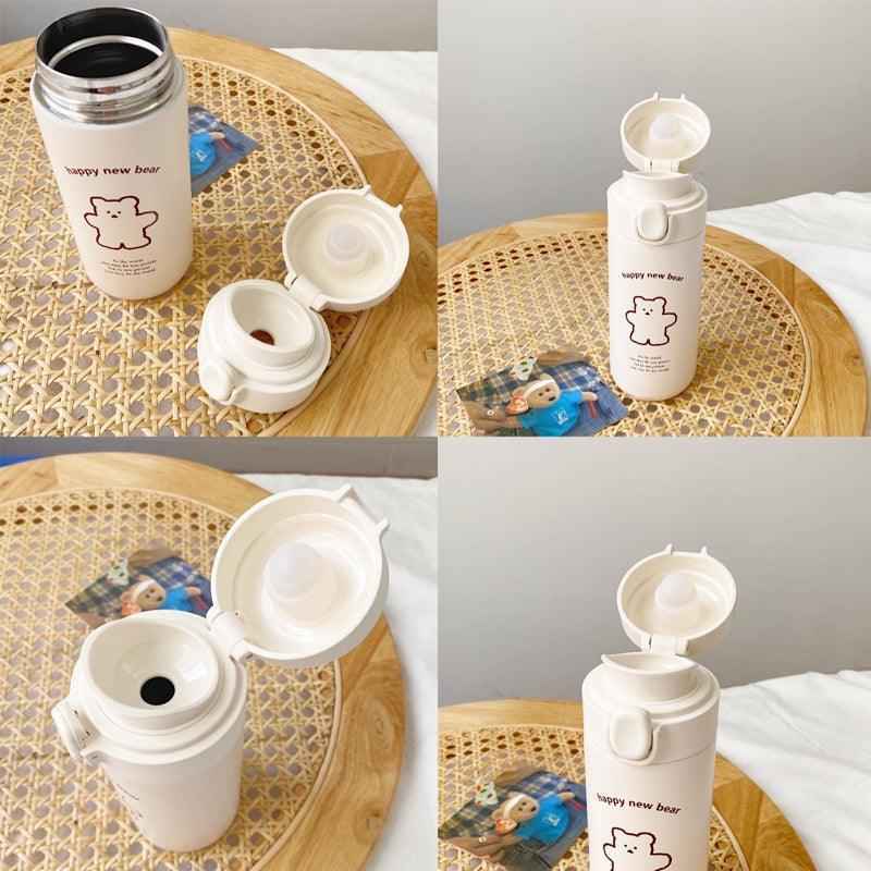 Cute Bear travel flask by Shaketea, cream vacuum insulated water bottle with flip-top lid on Tampa Home & Garden Store