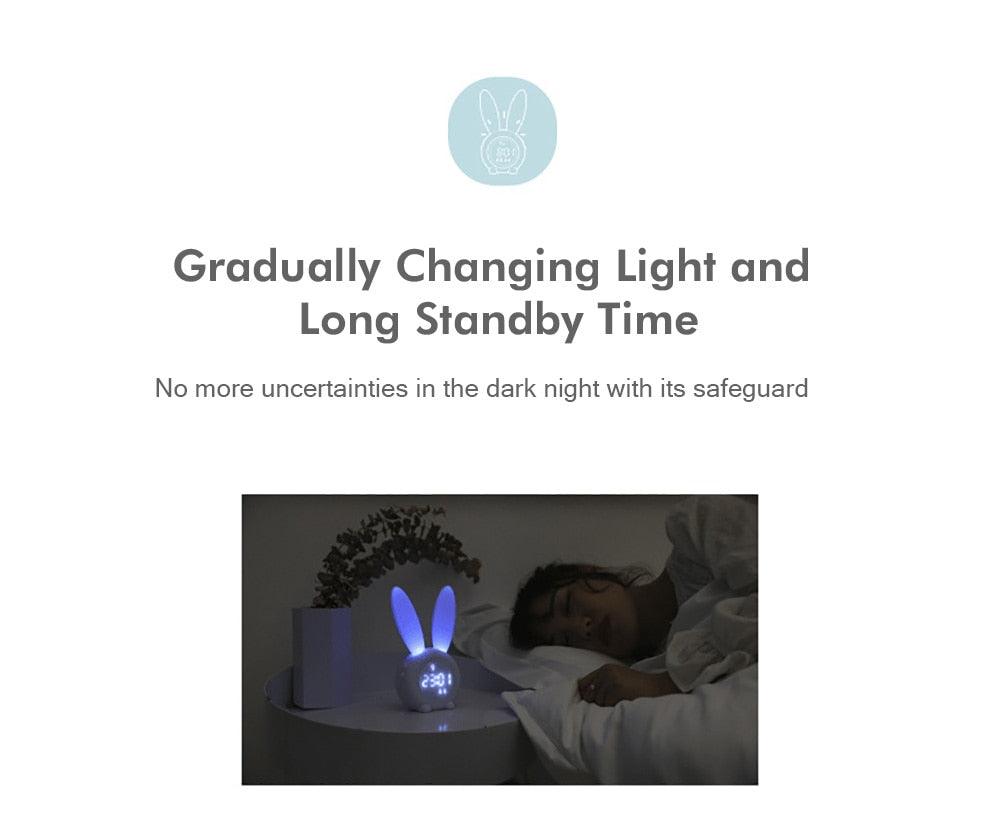 Cute Bunny Ear LED Alarm Clock by Stevvex with blue glowing ears on kids bedside table on Tampa Home & Garden Store
