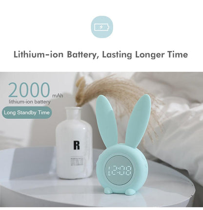 Mint green bunny-ear LED alarm clock for kids with digital bedside display on a white table on Tampa Home & Garden Store