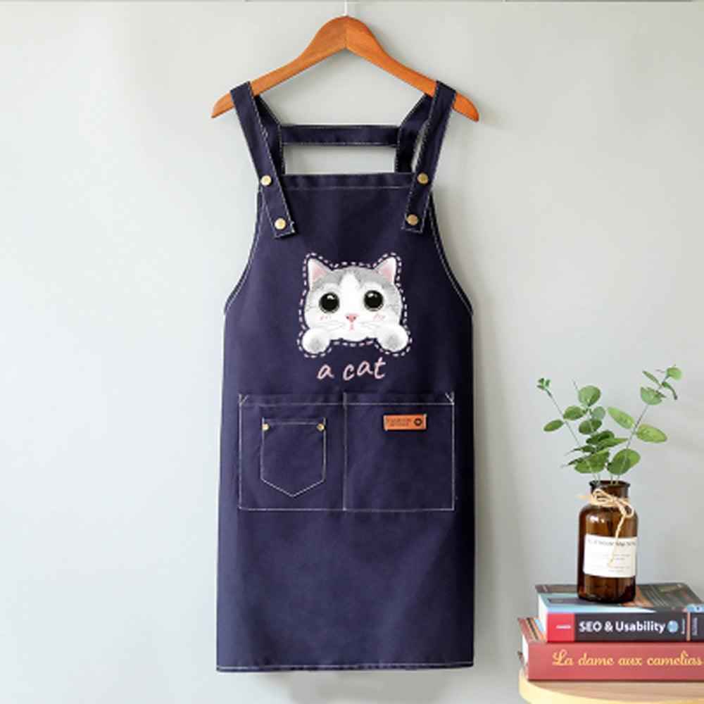 Shaketea cat apron in navy durable canvas with a cute white cat face and two front pockets on Tampa Home & Garden Store