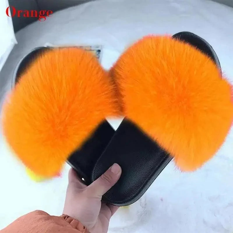 Stevvex fluffy orange fur slippers pair with black sole and strap indoor warm fuzzy flip flops for women on Tampa Home & Garden Store