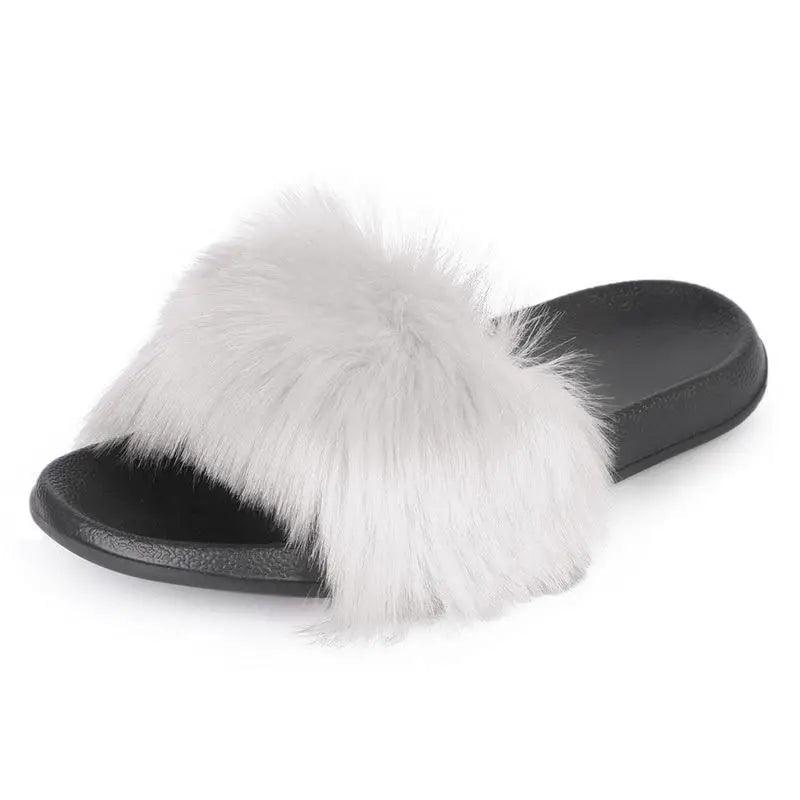 Fluffy fur slippers by Stevvex, white faux fur strap with black sole on Tampa Home & Garden Store