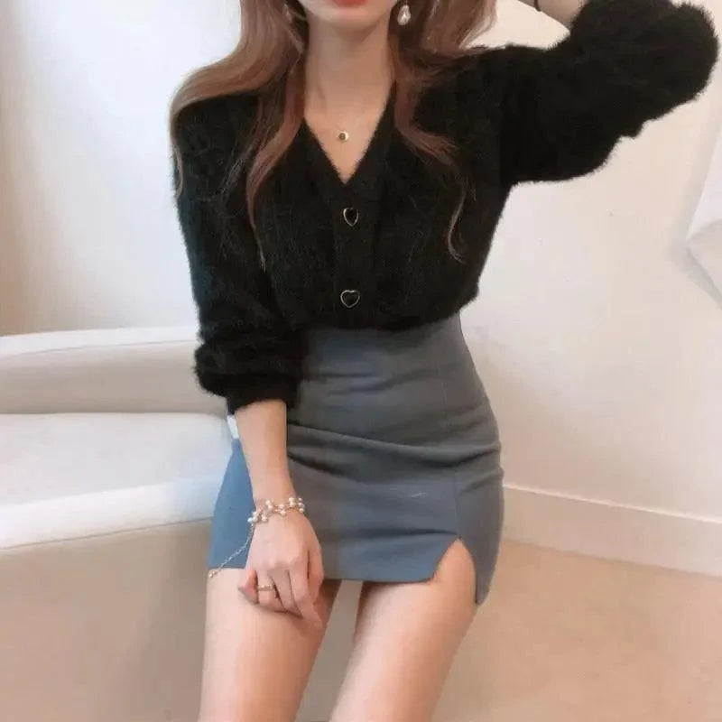 Stevvex cardigan black fuzzy knit with V-neck and heart buttons paired with blue mini skirt on Tampa Home & Garden Store