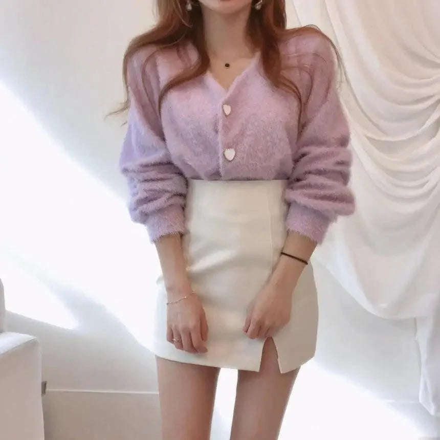 Stevvex lavender mink-knit cardigan with V-neck and heart buttons, paired with white mini skirt on Tampa Home & Garden Store