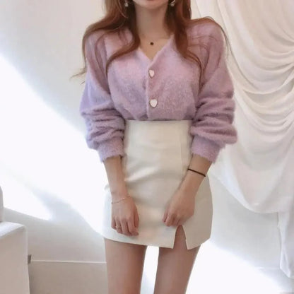 Stevvex lavender mink-knit cardigan with V-neck and heart buttons, paired with white mini skirt on Tampa Home & Garden Store