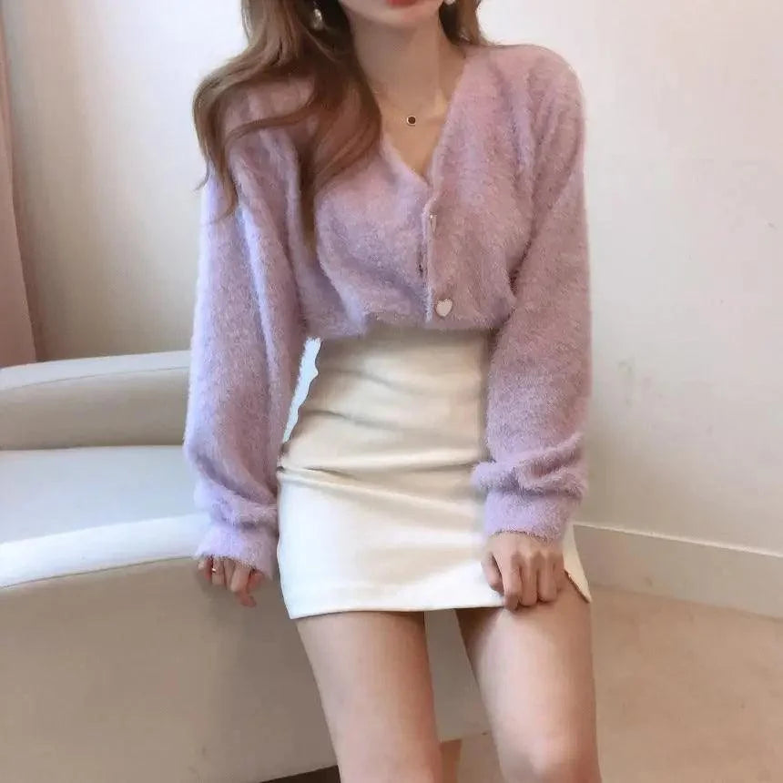 Cardigan lavender V-neck fuzzy knit with heart button, long sleeves, white mini skirt on Tampa Home & Garden Store