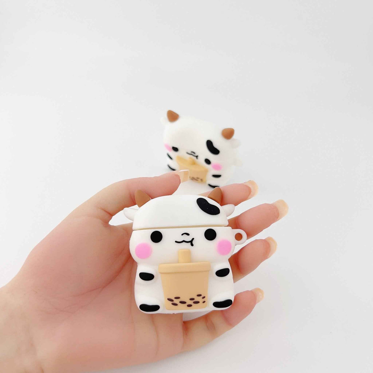 Shaketea Milk Cow Boba AirPods case silicone cow design with pink cheeks on Tampa Home & Garden Store