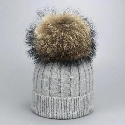 Stevvex STIL6866KMLLF gray ribbed knit beanie with fluffy brown-to-black pom pom on Tampa Home & Garden Store