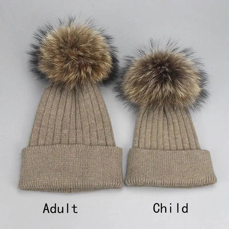 Beige knit beanie set for adults and kids with fluffy faux fur pom-poms on Tampa Home & Garden Store