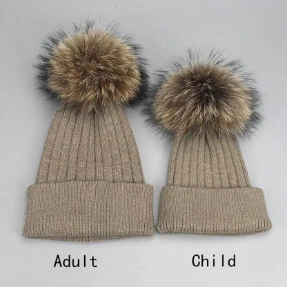Beige knit beanie set for adults and kids with fluffy faux fur pom-poms on Tampa Home & Garden Store