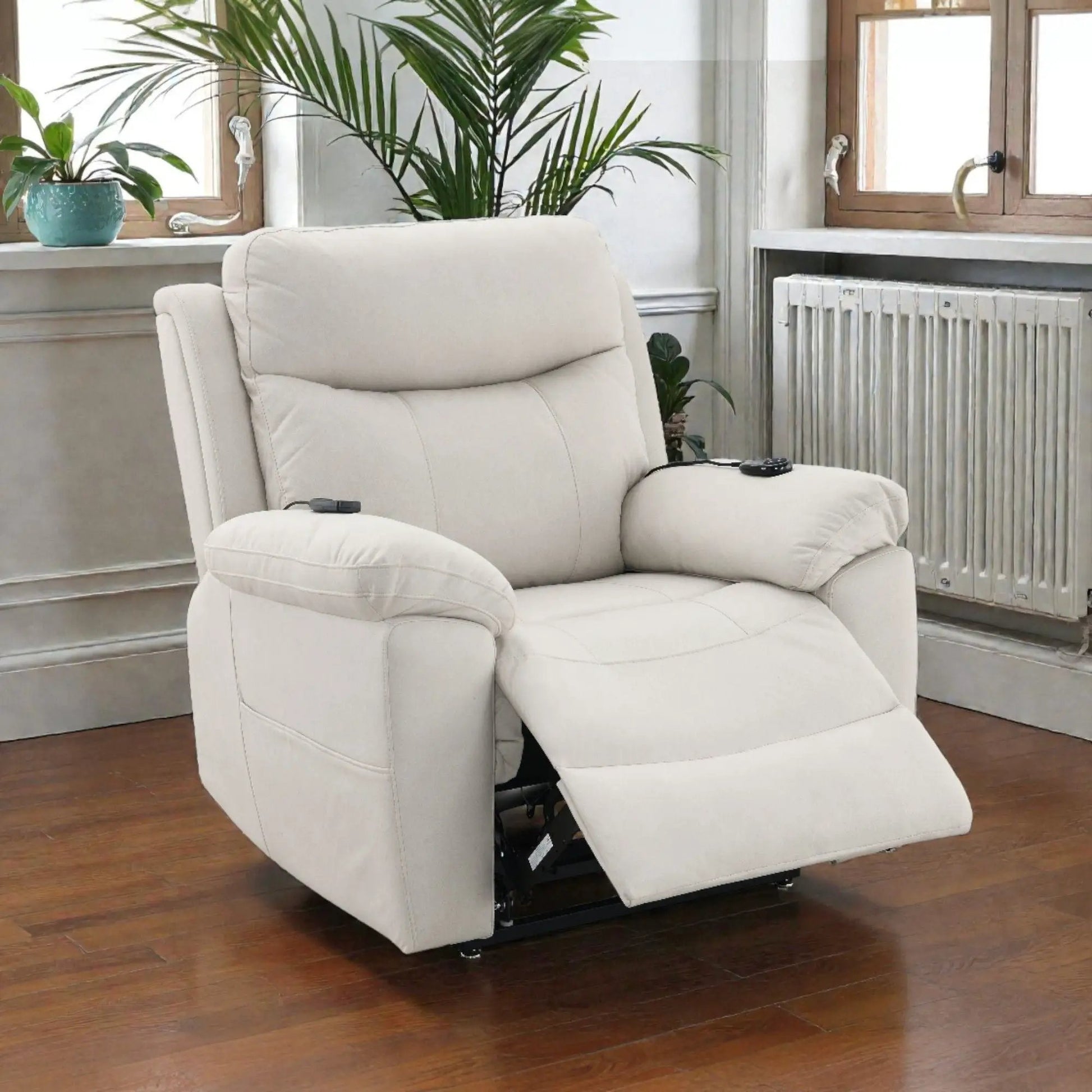 Beige Chriki power motion massage recliner with lift and extended footrest in a living room on Tampa Home & Garden Store