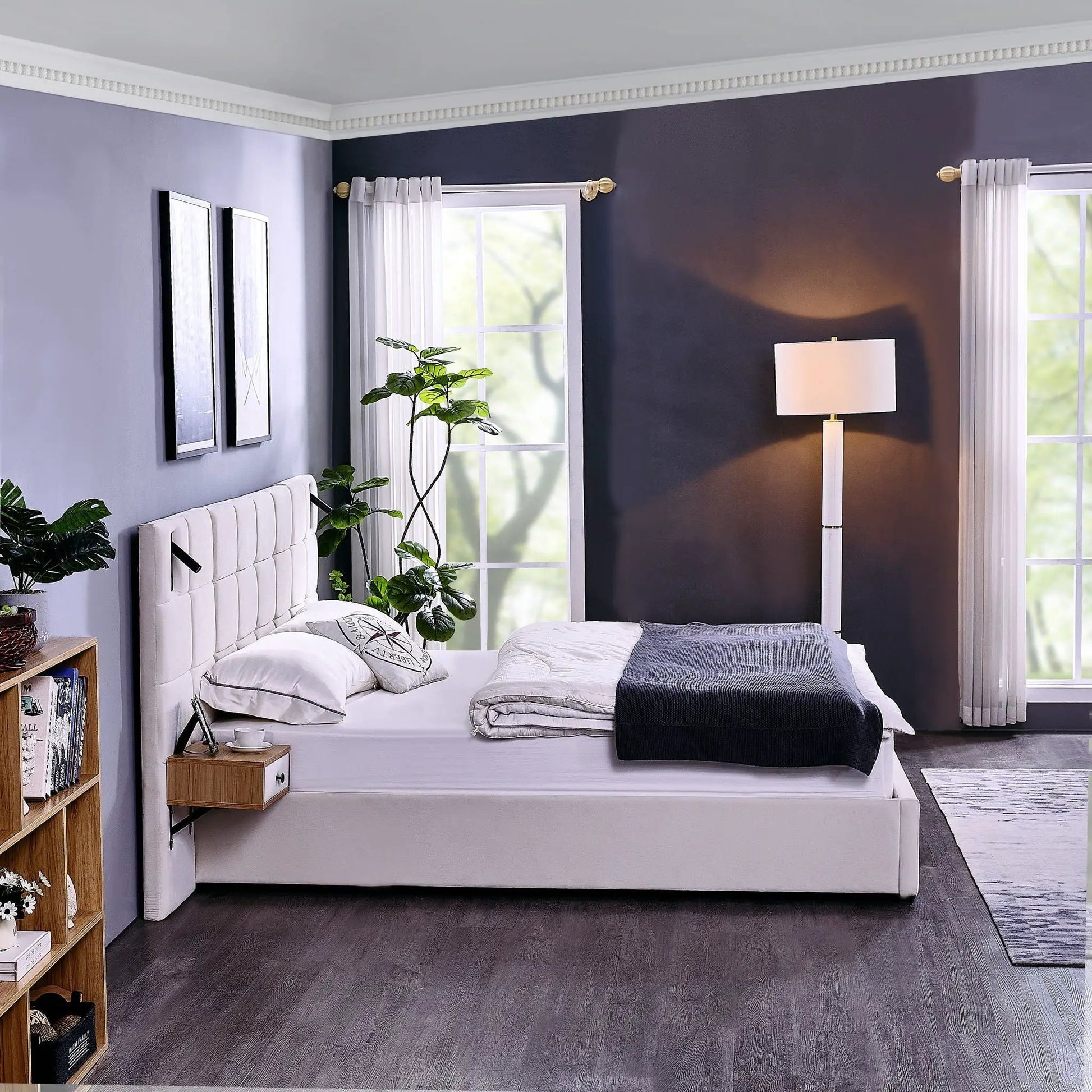 Upholstered hydraulic platform bed with tufted headboard and white bedding in lavender room on Tampa Home & Garden Store