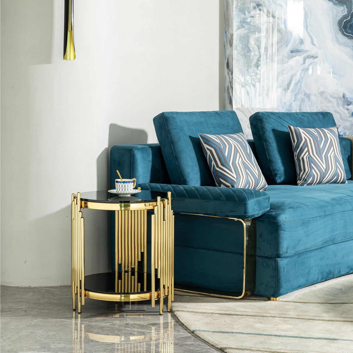 Elegant Round Table with Double Layer Tempered Glass Top, gold frame beside teal velvet sofa on Tampa Home & Garden Store