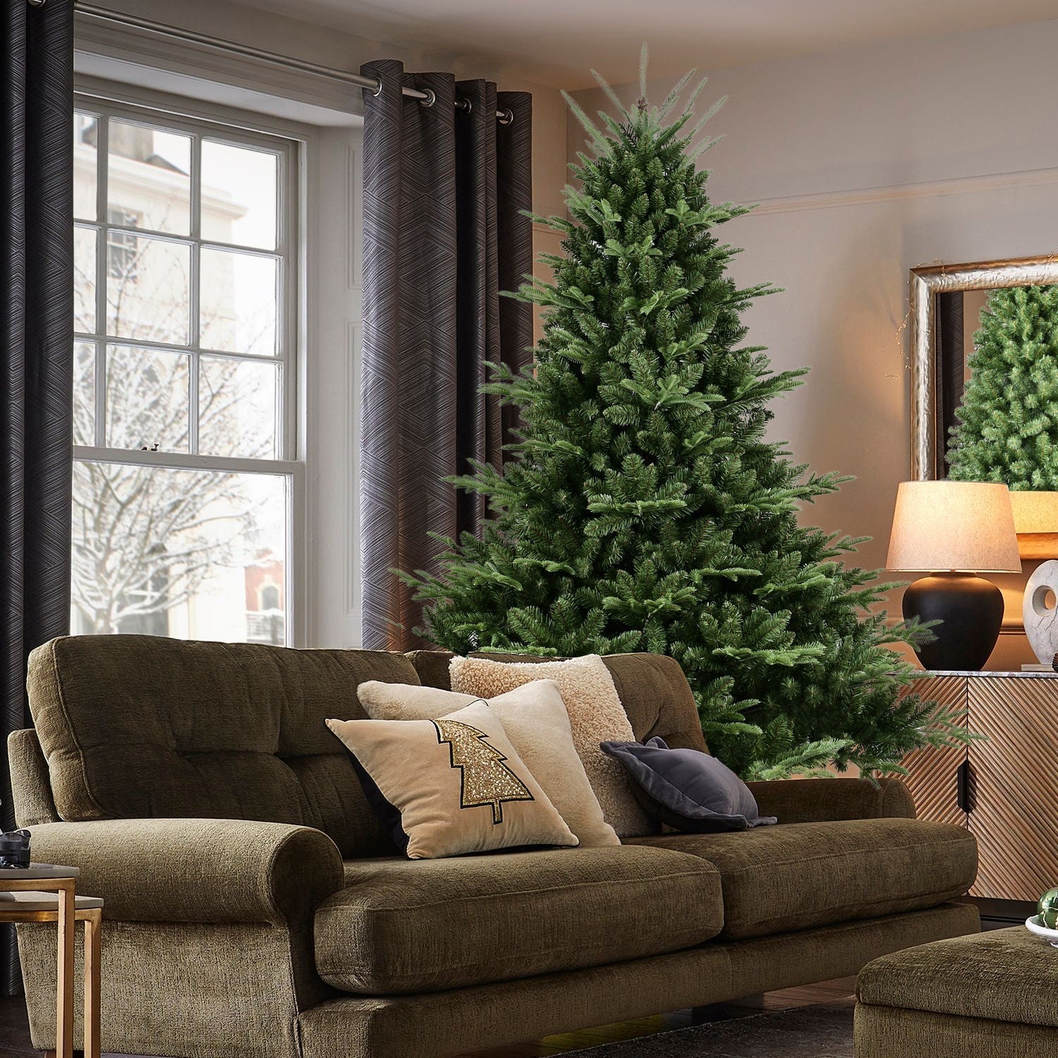 Full-shaped 6 ft Christmas tree HouseOfZazla with 1673 PE/PVC tips in room beside sofa on Tampa Home & Garden Store