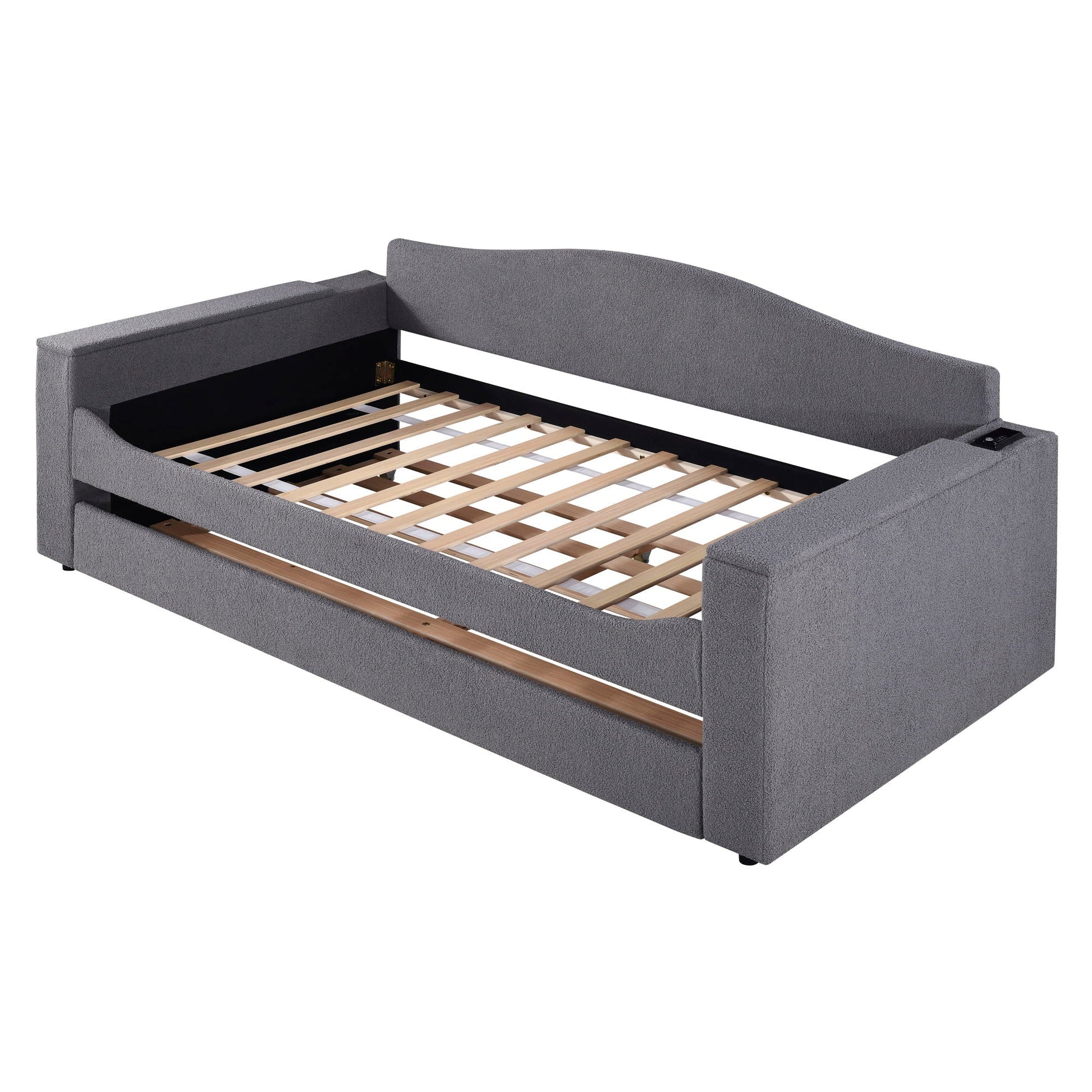 Upholstered gray daybed with storage armrests, trundle and visible wooden slat base on Tampa Home & Garden Store