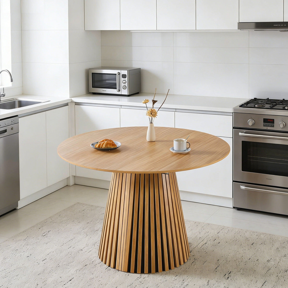 HouseOfZazla extendable pedestal dining table in oak with mid-century design, round slatted base on Tampa Home & Garden Store