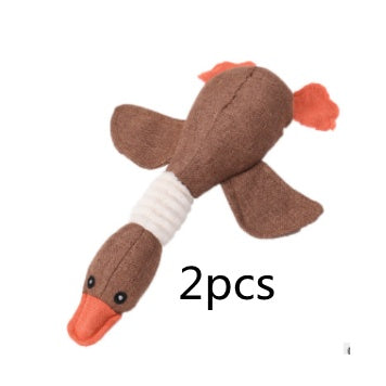 2pcs brown plush pet toys with orange beaks and tails, white midsection, squeaky features on Tampa Home & Garden Store