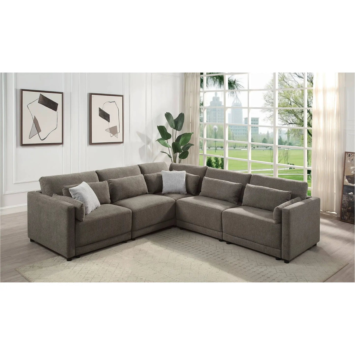 Rylie modular stationary sectional sofa with toss pillows in soft gray fabric on Tampa Home & Garden Store