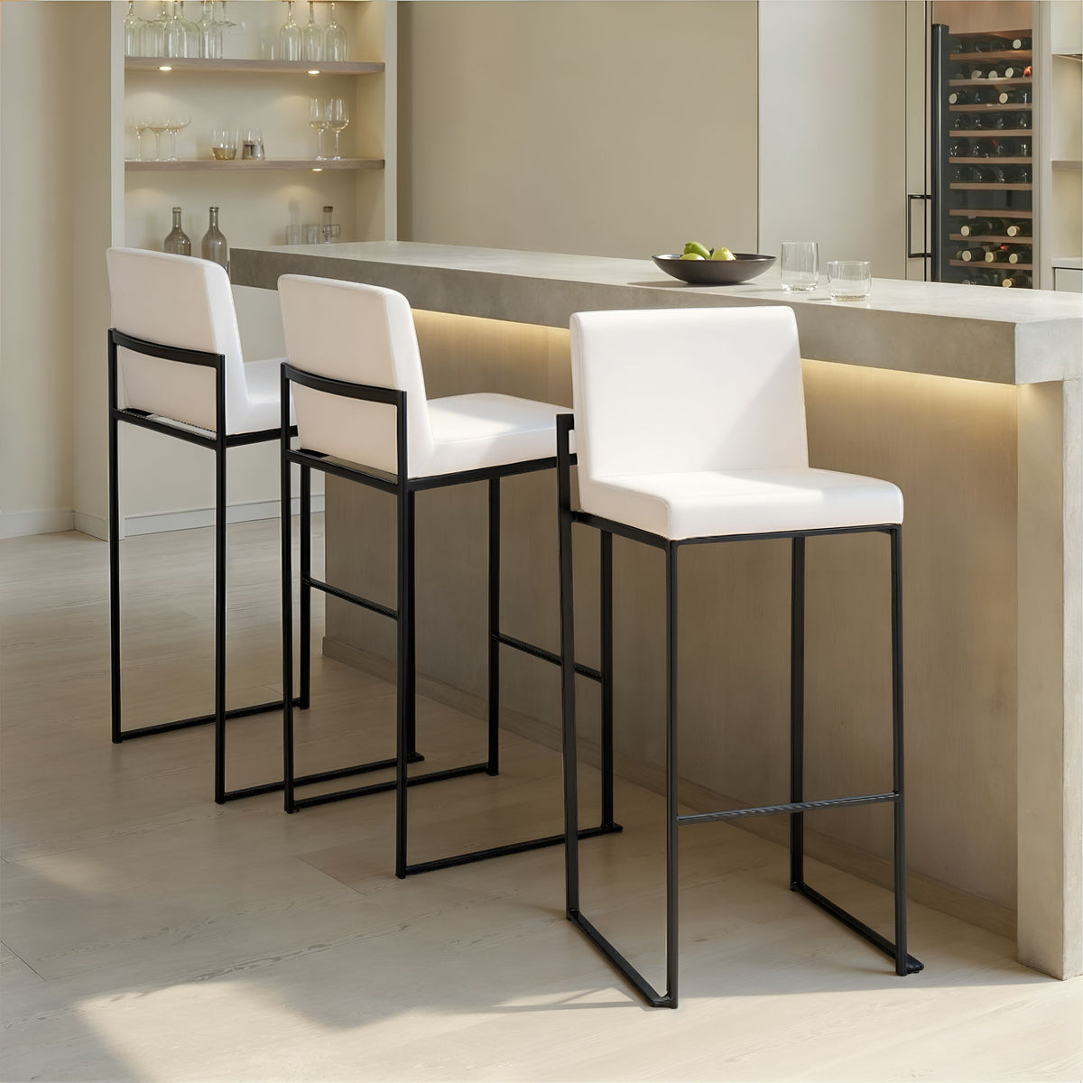 High back barstool set in white upholstery with black metal frames, 4 stools at island on Tampa Home & Garden Store