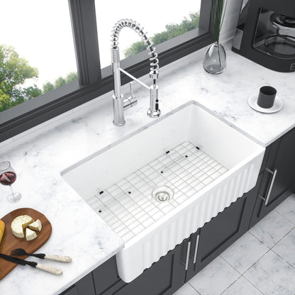 Farmhouse apron-front ceramic single-bowl kitchen sink with chrome pull-down faucet on Tampa Home & Garden Store