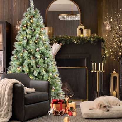 8 ft Full-Bodied Pre-Decorated Pinecone Christmas Tree by HouseOfZazla with pinecones and warm lights in a cozy living room on Tampa Home & Garden Store