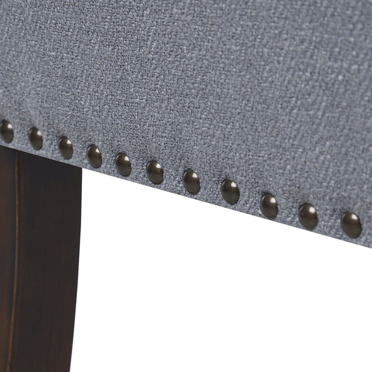Upholstered bench in gray fabric with solid wood frame and brass nailhead trim on Tampa Home & Garden Store