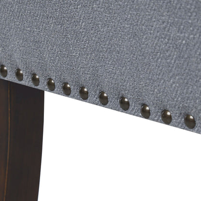 Upholstered bench in gray fabric with solid wood frame and brass nailhead trim on Tampa Home & Garden Store