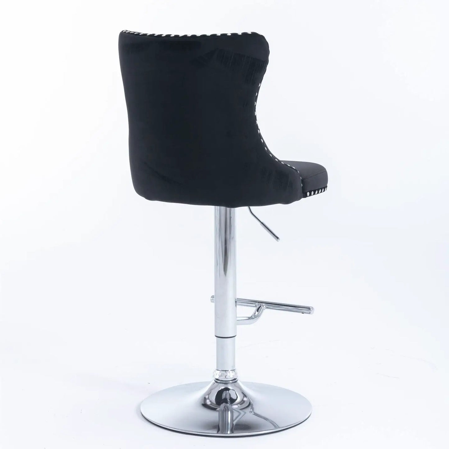 Black faux-leather swivel bar stool with tufted back and chrome base, adjustable height lever on Tampa Home & Garden Store