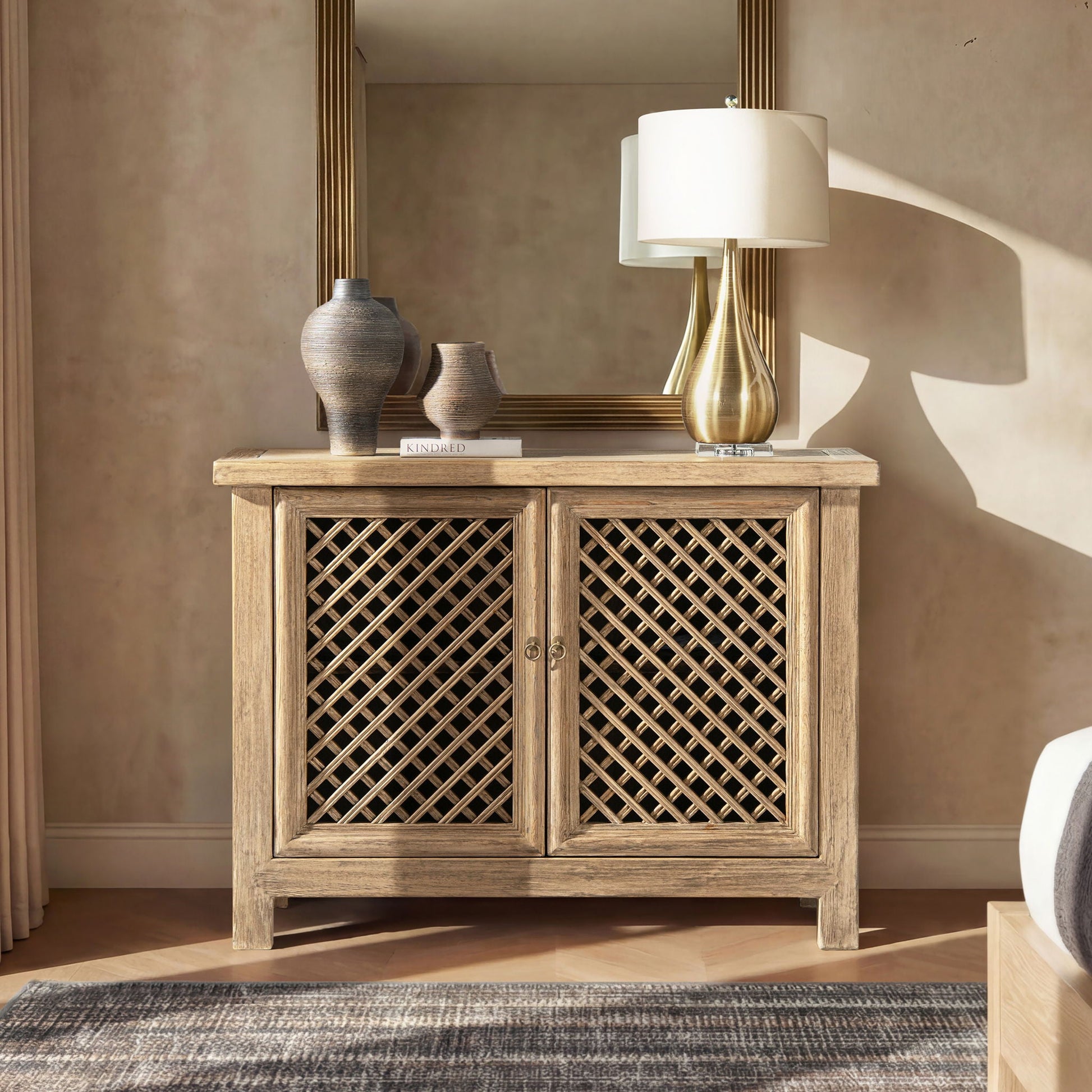 Arden 2-Door Accent Storage Cabinet wood with lattice doors, topped by lamp and two vases on Tampa Home & Garden Store