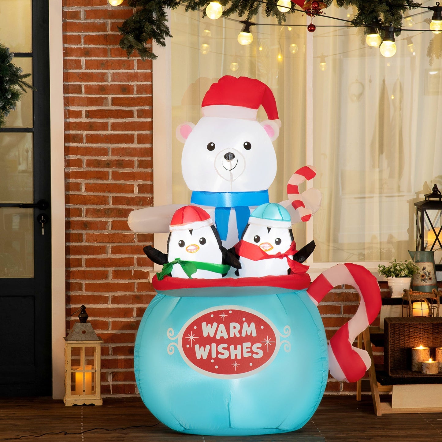 Outsunny 5ft Christmas inflatable polar bear in blue cup with two penguins candycanes warm wishes on Tampa Home & Garden Store