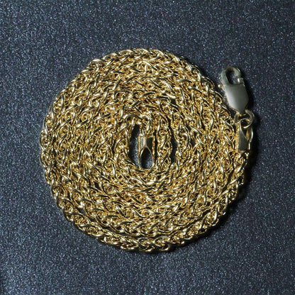 14k yellow gold 2.8mm light-weight wheat chain necklace with gold links on dark background on Tampa Home & Garden Store