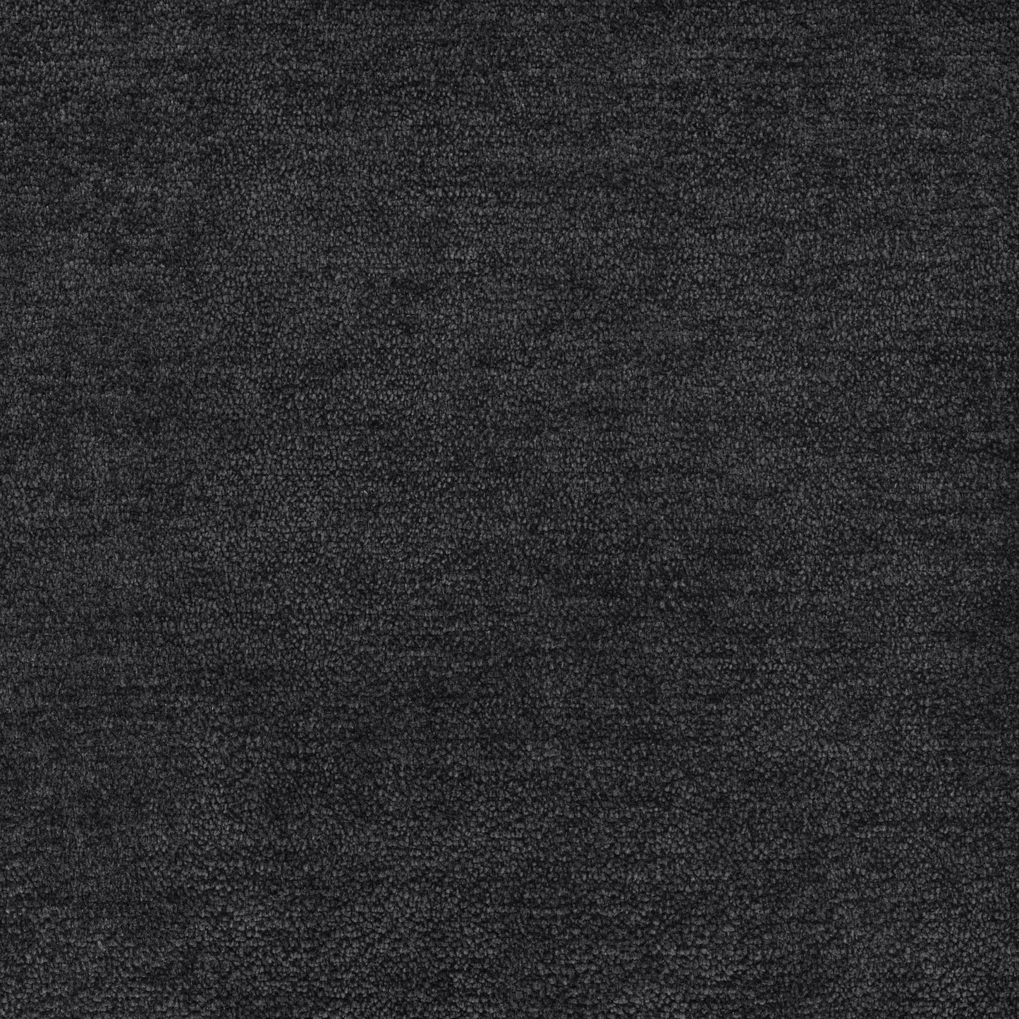 Sectional sofas backdrop: dark charcoal textured carpet close-up on Tampa Home & Garden Store