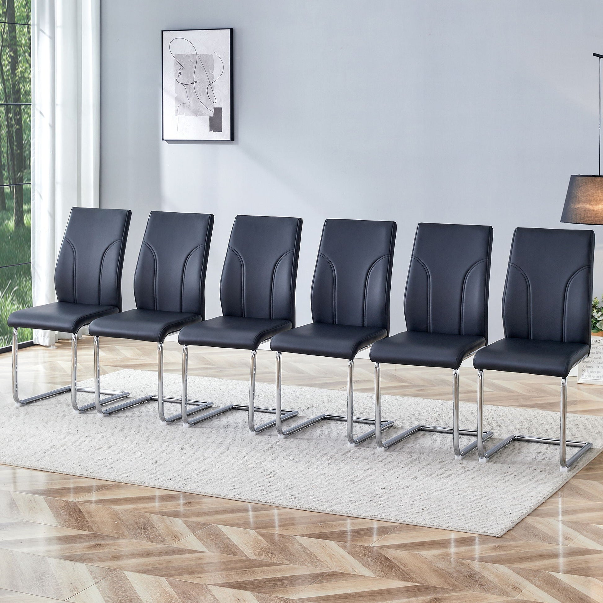Modern dining chairs with high backs, black upholstery and chrome legs in a row, chair set on Tampa Home & Garden Store