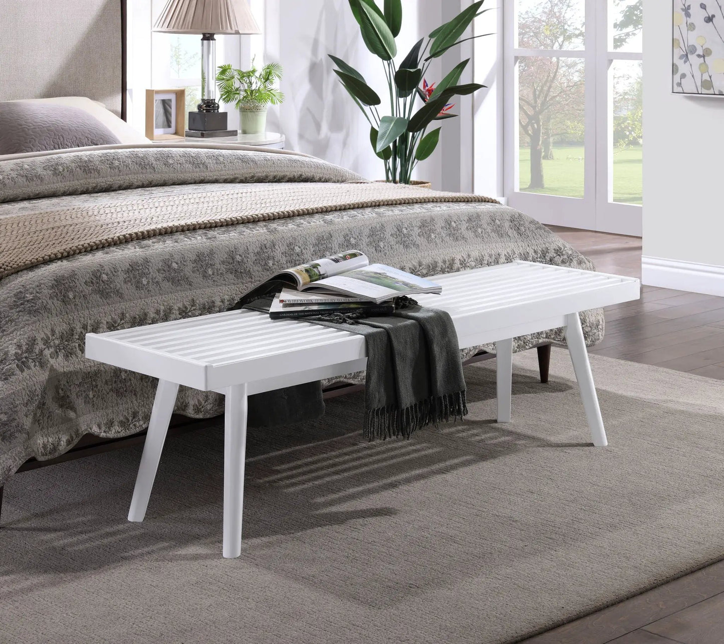 Larwich solid wood slatted bench, white finish at foot of bed in bright bedroom on Tampa Home & Garden Store