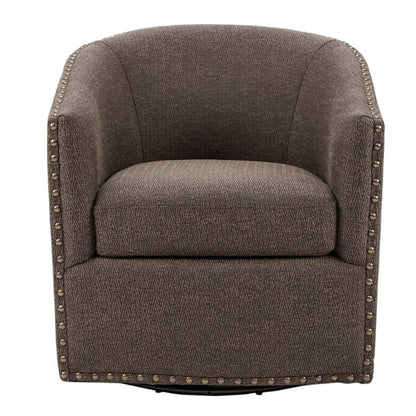 Luxurious swivel chair in brown patterned fabric with nailhead trim and studded arms on Tampa Home & Garden Store
