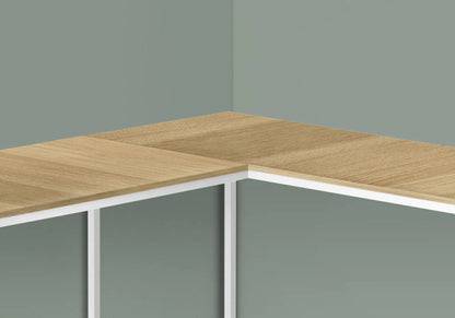 Corner L-shaped computer desk with natural wood grain top and white metal frame on Tampa Home & Garden Store